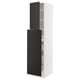 A modern, tall, white kitchen cabinet with black doors. It an adjustable shelf and a high-quality, sleek design.