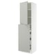 A white SEKTION cabinet with grey havstorp fronts, featuring a door and adjustable shelves.