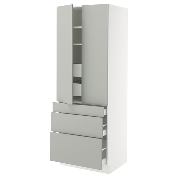 A white SEKTION kitchen cabinet with grey drawers. It has two doors and four drawers, featuring a sleek, modern design.