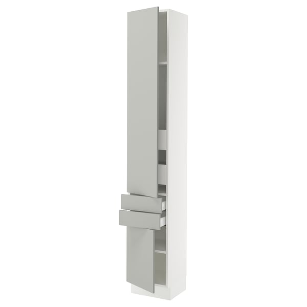 A white SEKTION cabinet with a sleek grey handle and shelves. Its tall, rectangular, and modern with adjustable shelves.