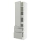 A modern, tall white cabinet from IKEAs SEKTION kitchen system with light grey drawers and shelves, featuring an open door and drawers.