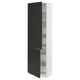 White cabinet, black doors, one open.
