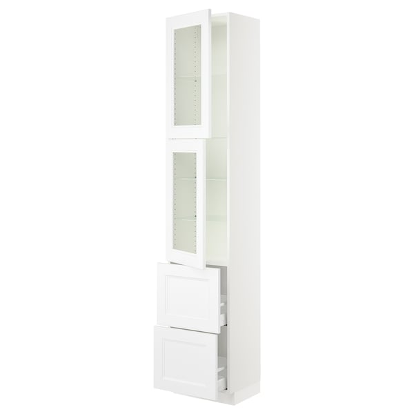 White SEKTION kitchen cabinet with glass doors and drawers.