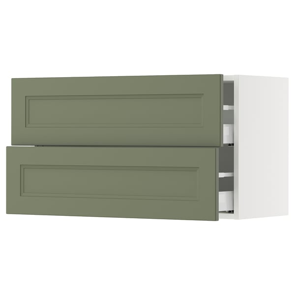 Image gray-green SEKTION kitchen drawers. Two open drawers show soft-close runners.