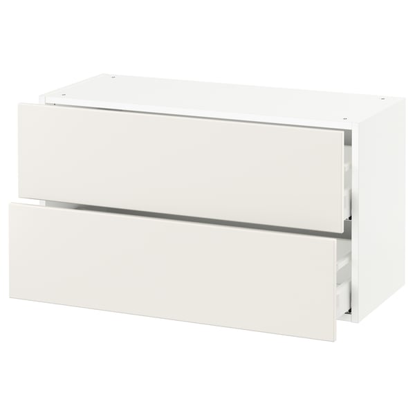 A white SEKTION kitchen cabinet with two drawers. Its sleek, modern, and smooth, minimalistic design.
