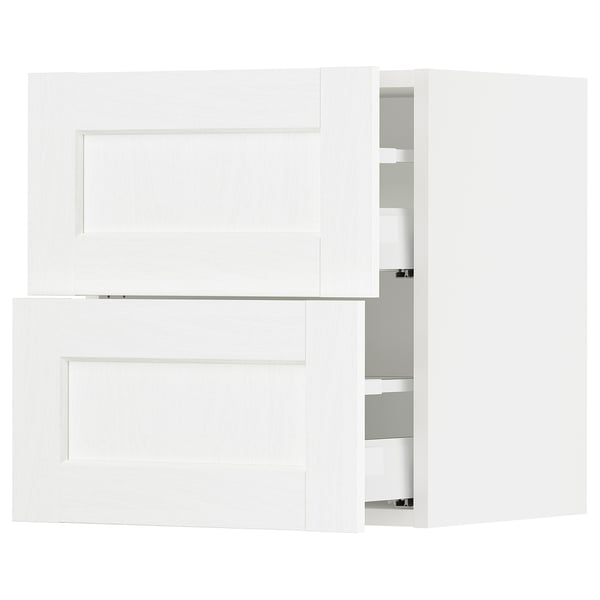 Displays a white SEKTION kitchen cabinet set with modern design and multiple drawers.