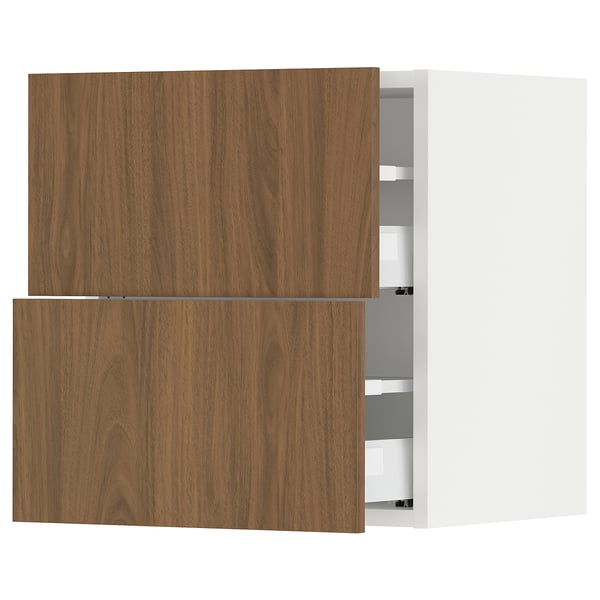 Modern ikea SEKTION kitchen cabinet with walnut fronts, 2 closed doors, 1 open.
