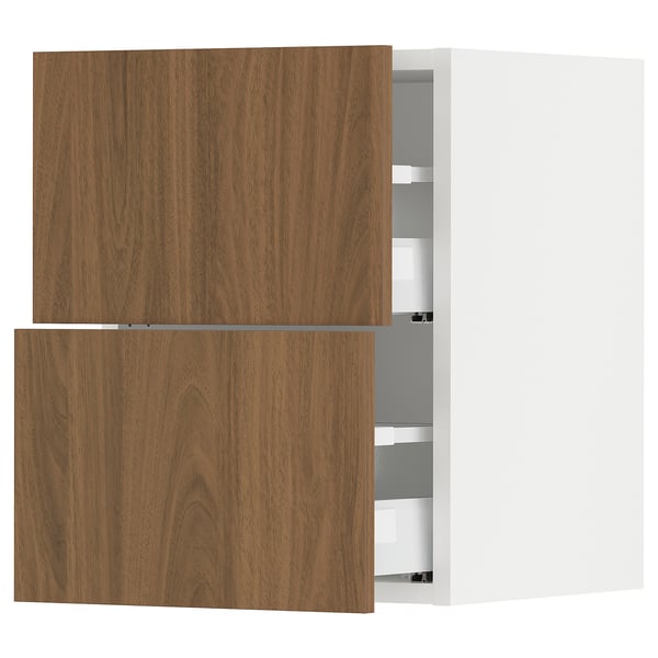 Two-tone kitchen cabinet with wooden doors open revealing shelves. Dark wood doors, white interior.