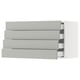 Modern grey kitchen drawers, sleek design, three full-extension drawers.