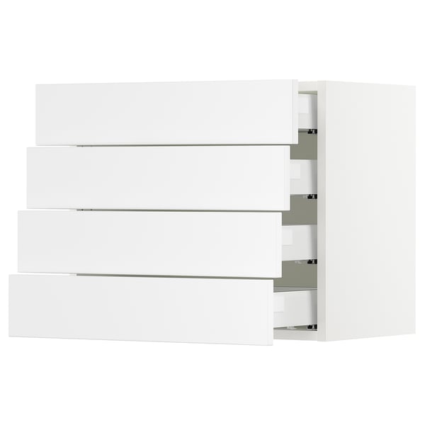 White SEKTION kitchen cabinets with modern, sleek design, featuring multiple drawers and wall-mounted units.
