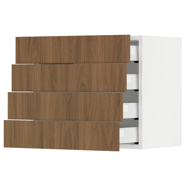 Modern kitchen unit. Wooden drawers, white frame. Sleek, flat design.