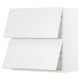 A white, rectangular kitchen cabinet from IKEAs SEKTION system, featuring two doors.