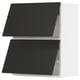 Modern black kitchen cabinets.