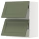 Green cabinet, flat doors, white sides, modern design.