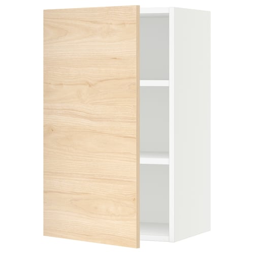 SEKTION kitchen cabinet in light ash wood, white interior, adjustable shelves with soft-closing hinge.