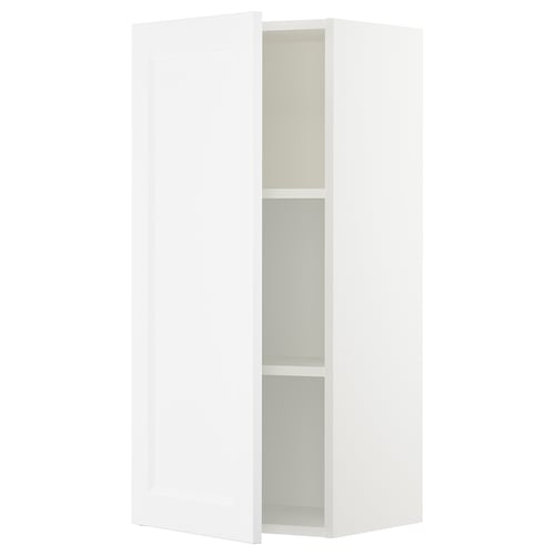 A white SEKTION kitchen cabinet with a sleek, modern look, featuring a single door and two shelves.
