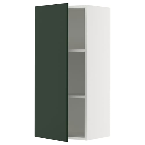 SEKTION kitchen cabinet in deep green with white frame, rectangular shape, modern design.