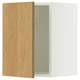 An open SEKTION kitchen cabinet with a light wood door and a white frame.