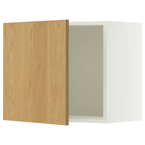 A white SEKTION kitchen cabinet with a light oak door, featuring a modern, minimalist design with a smooth finish.