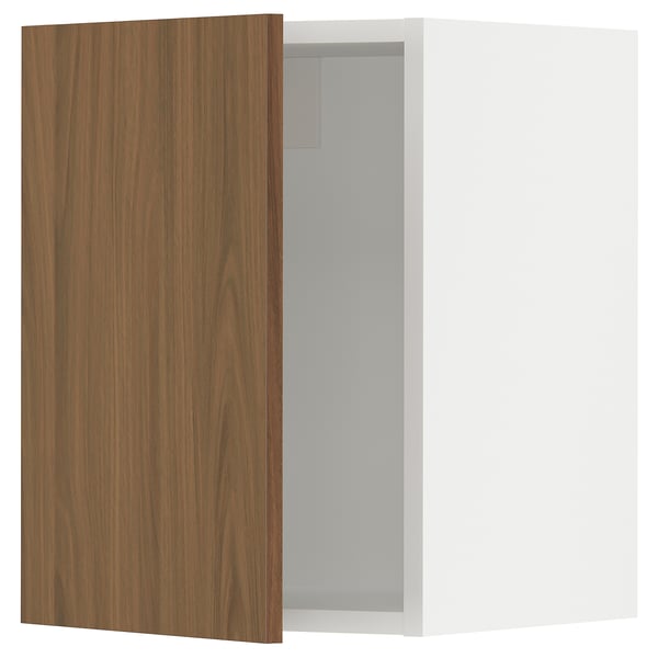 Brown wooden cabinet door attached to white cabinet, modern design.
