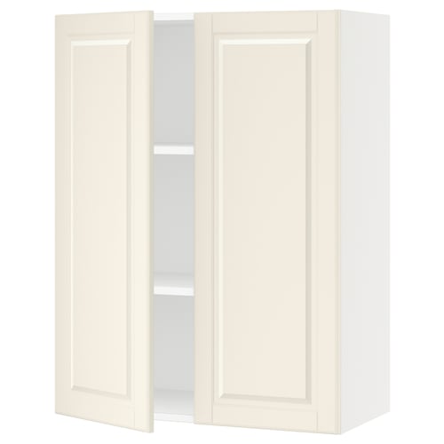 White SEKTION kitchen cabinet with off-white bodbyn doors, featuring bevelled edges and adjustable shelves, mounted on a wall.