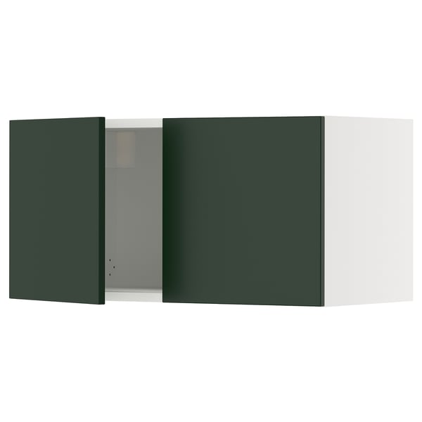 A green ikea SEKTION kitchen cabinet. Its rectangular, with a smooth finish, and a door with a hidden hinge design.