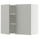 A modern light grey kitchen cabinet from the SEKTION system. It two doors and adjustable shelves.