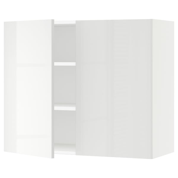 A high-gloss white SEKTION wall cabinet with adjustable shelves.