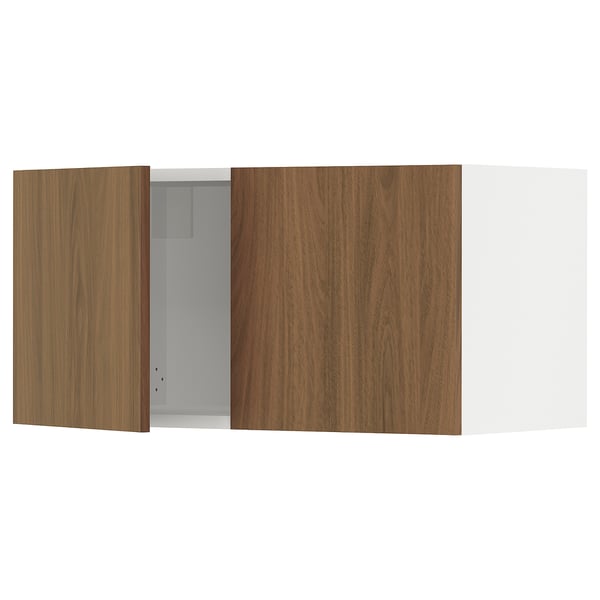 SEKTION kitchen: two wooden cabinets, one open. Brown, walnut finish, smooth surfaces.