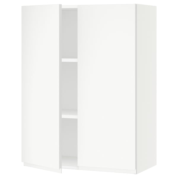 A white SEKTION kitchen cabinet with a modern, minimalist design featuring a push-open hinge and two shelves.