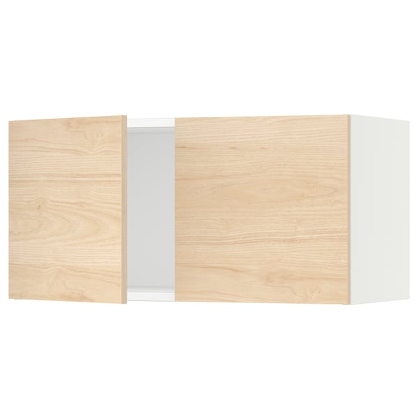 Wooden kitchen cabinet with light ash doors.