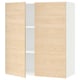 An ikea SEKTION kitchen cabinet with light ash wood-patterned doors and white interior shelves.