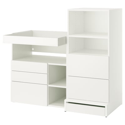 White ikea SMÅSTAD baby changing table and storage unit with drawers and shelves.