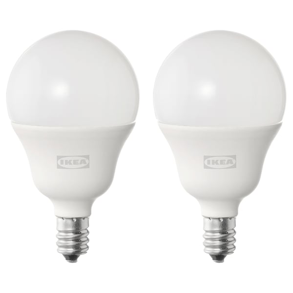 Two white ikea SOLHETTA bulbs side by side, round shape, aluminum base, smooth design.