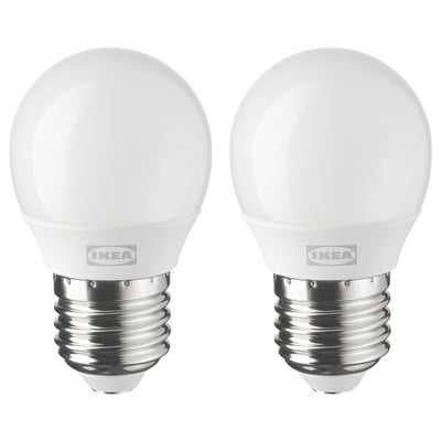 Two white spherical led bulbs with metallic bases, branded IKEA.