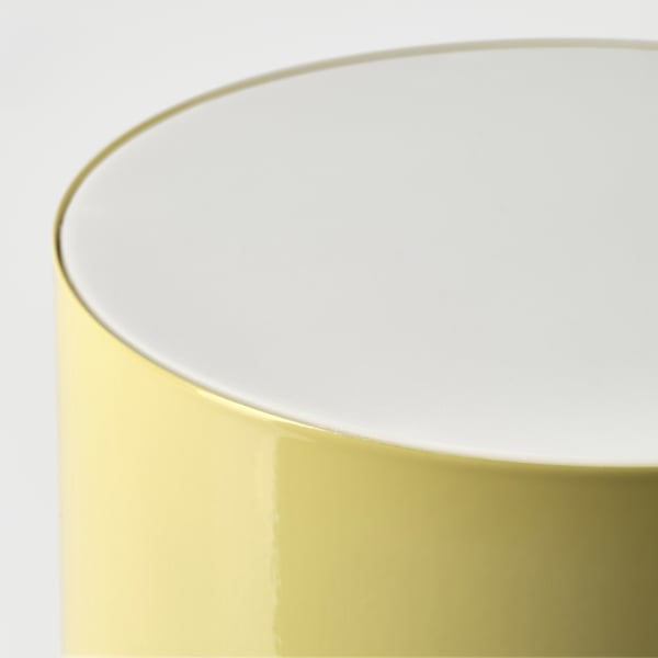 Sleek, modern table lamp with smooth gold finish, stylish curved design, and subtle reflective surface.