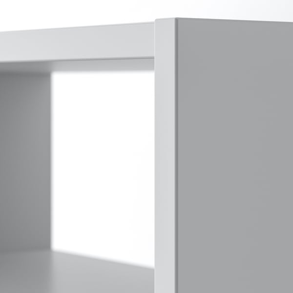 Minimalist white cabinet with sliding door, featuring clean lines and organised storage spaces.