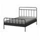 Black metal bed frame with mattress, grey cover.