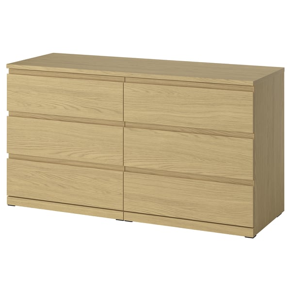 A light wood-colored STORKLINTA chest with six spacious drawers, sleek horizontal handles and a flat top.
