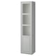 TÄNNFORSEN light grey tall cabinet with glass door. Slim, rectangular design with bevelled panels and vertical storage.