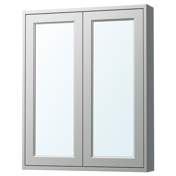 A TÄNNFORSEN light grey mirror cabinet with bevelled panels. Rectangular, two doors, and has a sleek modern design.