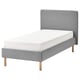 Grey upholstered single bed with wooden legs and white mattress.