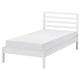 A TARVA bed frame in white, made of pine wood, with a simple and minimalist design featuring a slatted headboard.