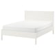 A white TONSTAD bed frame with a sleek, modern design and adjustable sides.