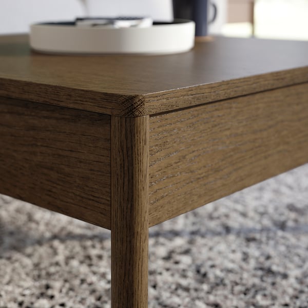 Wooden coffee table with smooth finish, fine craftsmanship.