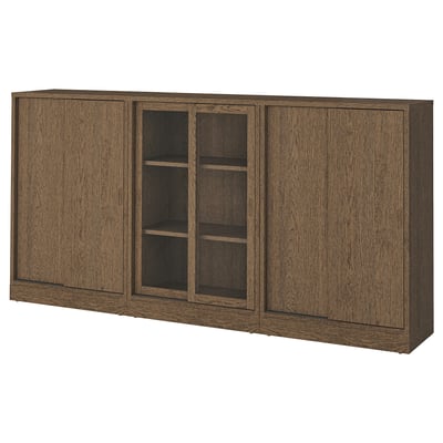 Brown wooden cabinet with sliding doors, three sections, central glass door, dark wood grain.
