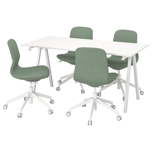 A TROTTEN white desk with four green chairs. Desk has a sleek, minimalist design. Chairs have green fabric seats and backs, with wheeled white bases.