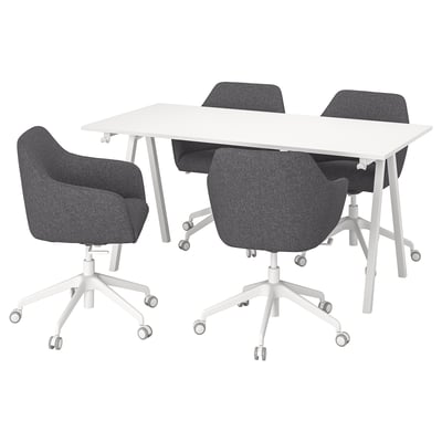 Modern office setup with four grey fabric chairs and a white table.