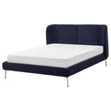 Blue bed, curved headboard, metal legs, modern.