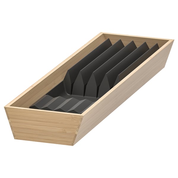 UPPDATERA: wooden knife organiser with black compartments. Rectangular shape and sleek design.